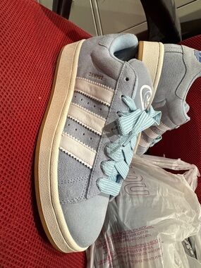 adidas womansLight Blue Suede Sneakers with White Stripes